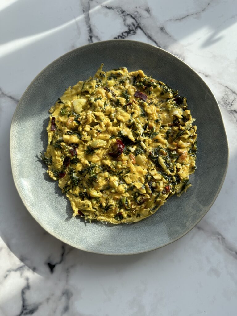 Fennel, carrot tops and fresh chili omelet